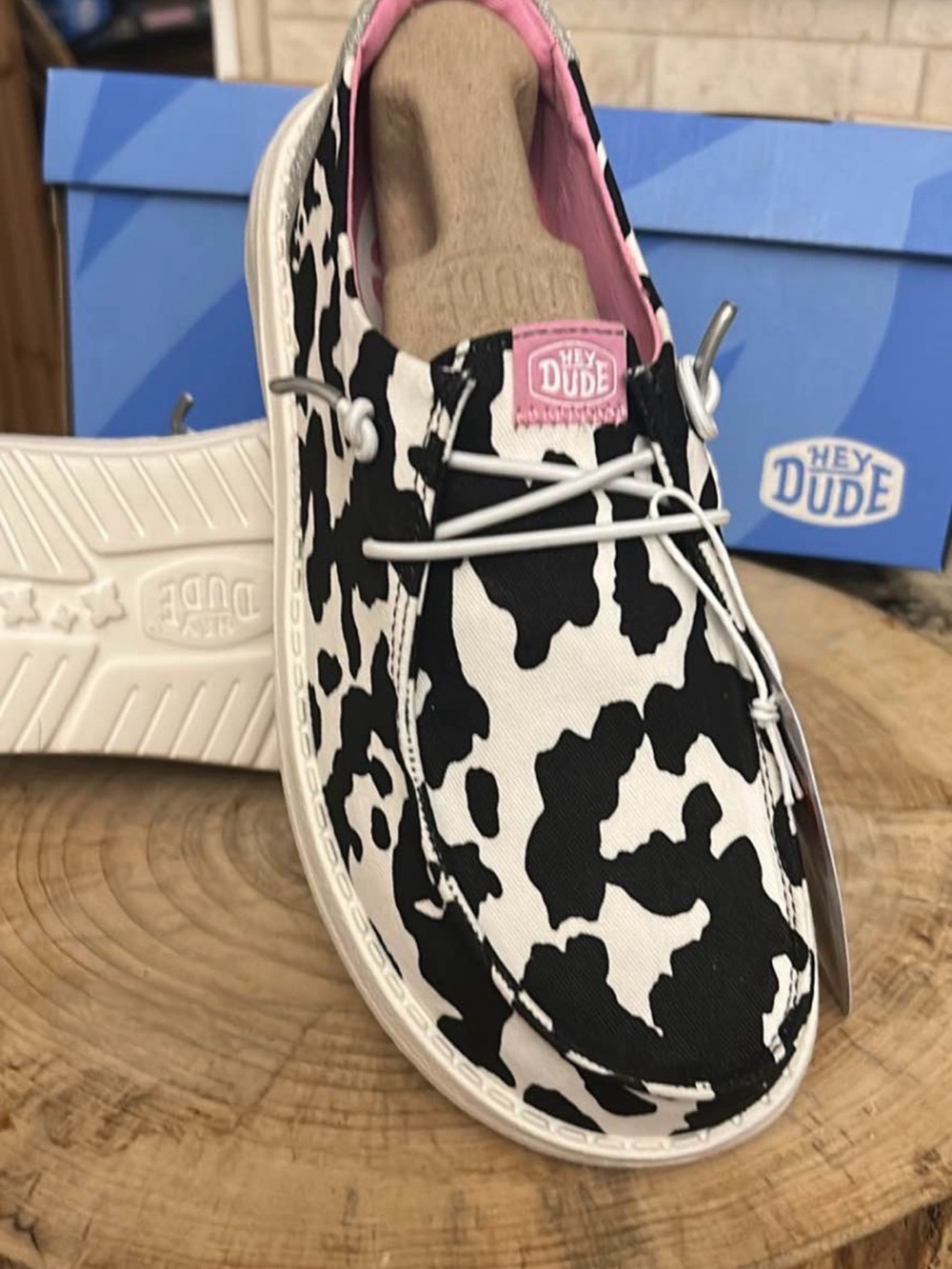 Hey Dude Cow Print Slip-On Shoes with Pink Accent - Picture 4 of 6